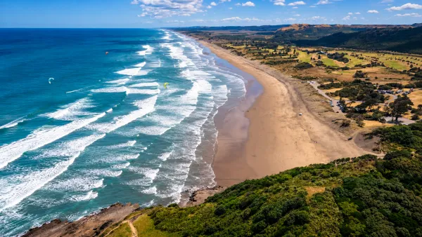 Kitesurfing in Muriwai Beach, New Zealand